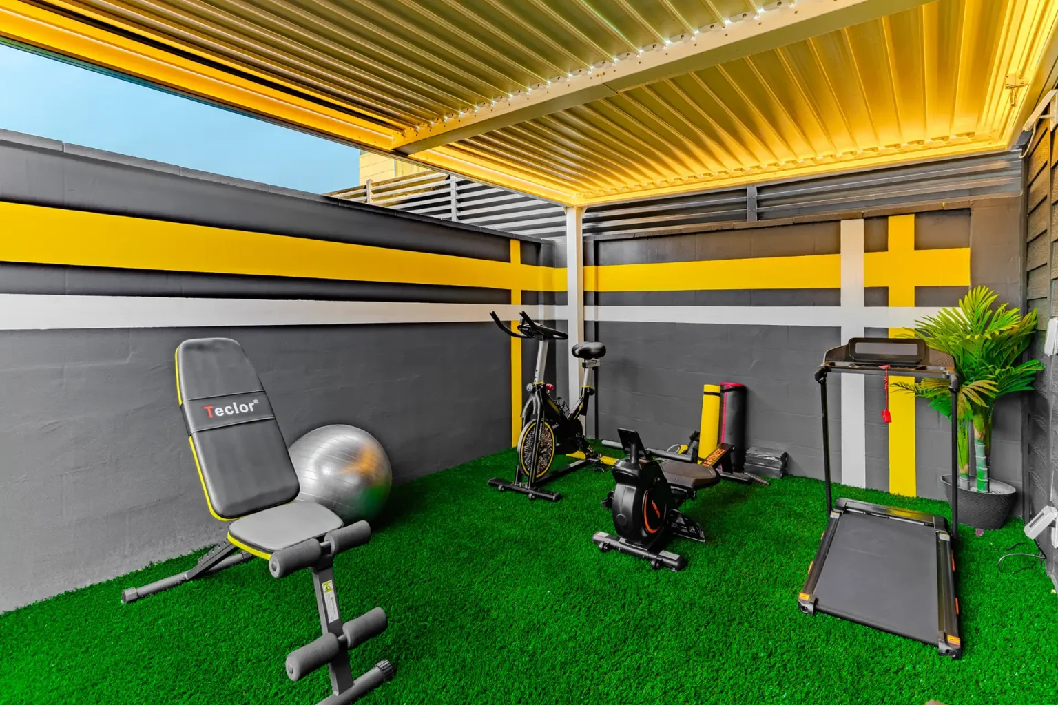 Private gym with cardio and strength equipment