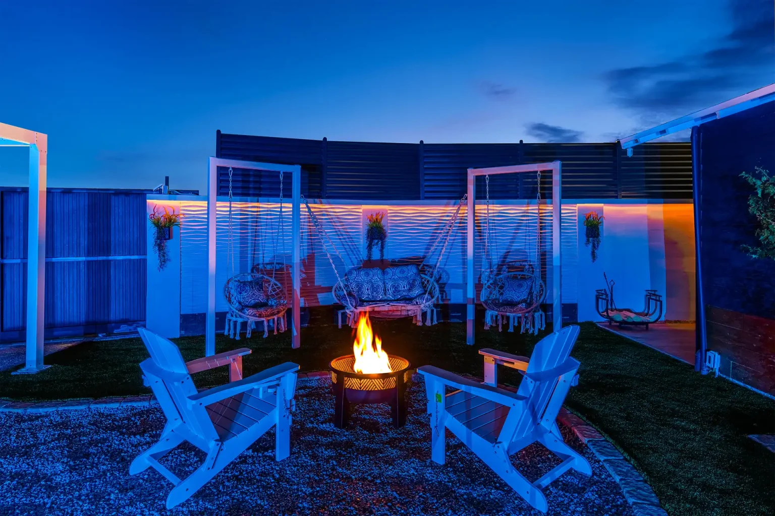 Avena private fire pit courtyard at twilight