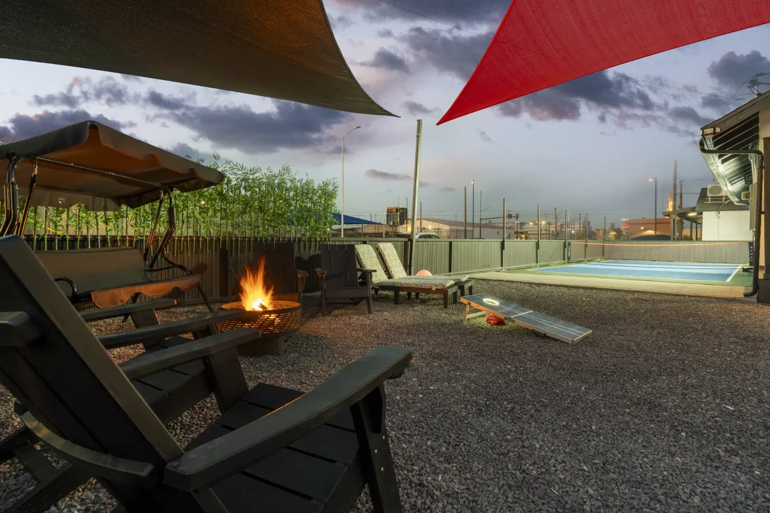 Crescendo fire pit and pool at twilight