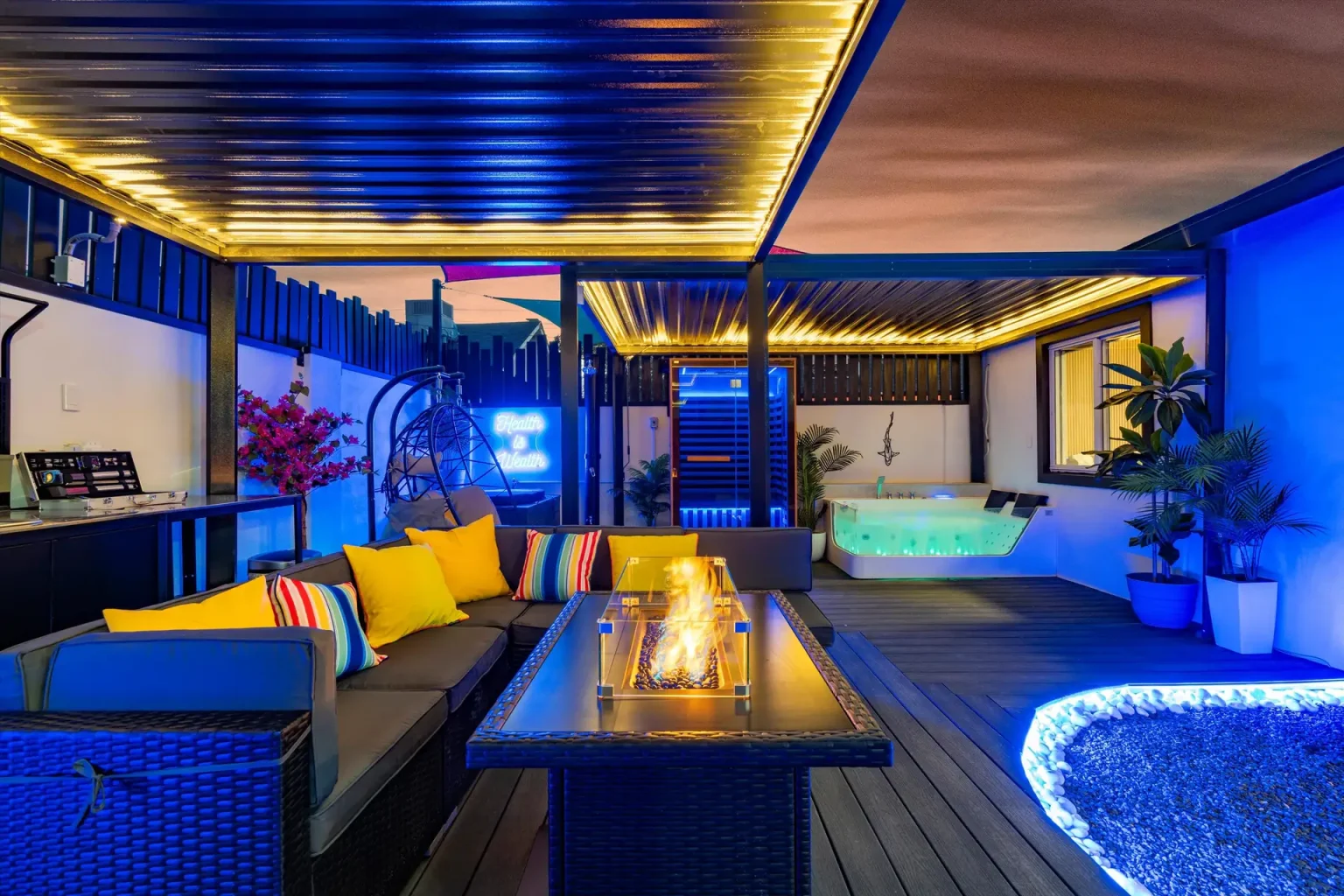 Euphoria fire lounge, jacuzzi and sauna at twilight
