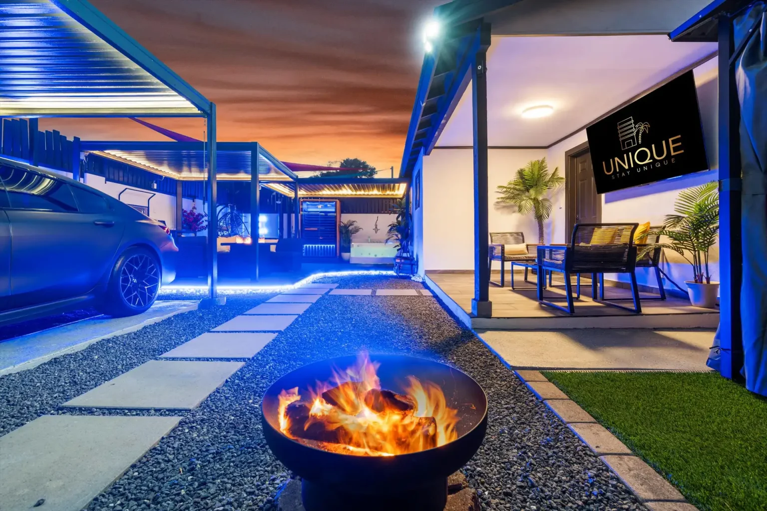 Euphoria fire pit and private courtyard at twilight