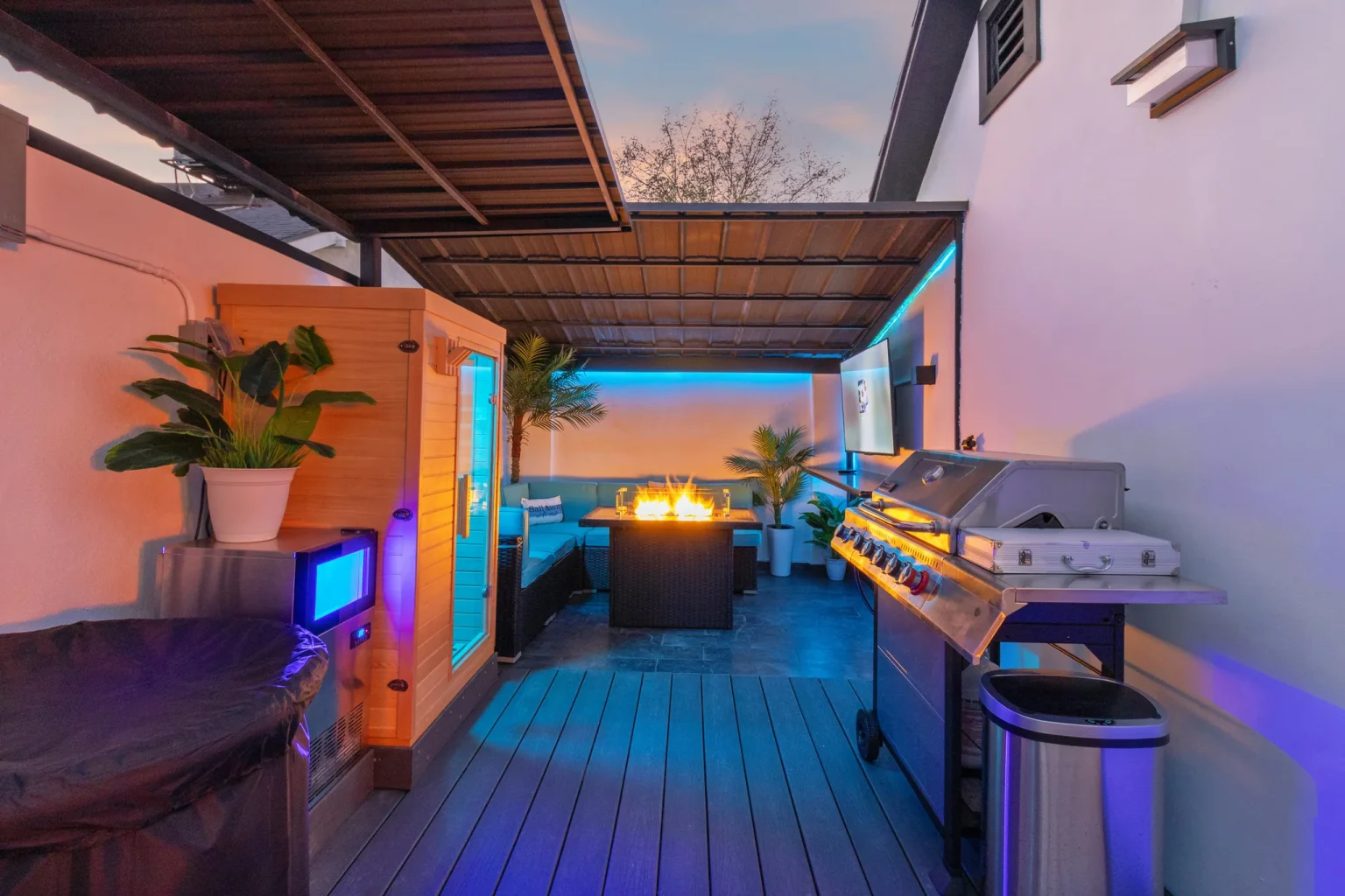 Solace outdoor sauna, fire table and kitchen